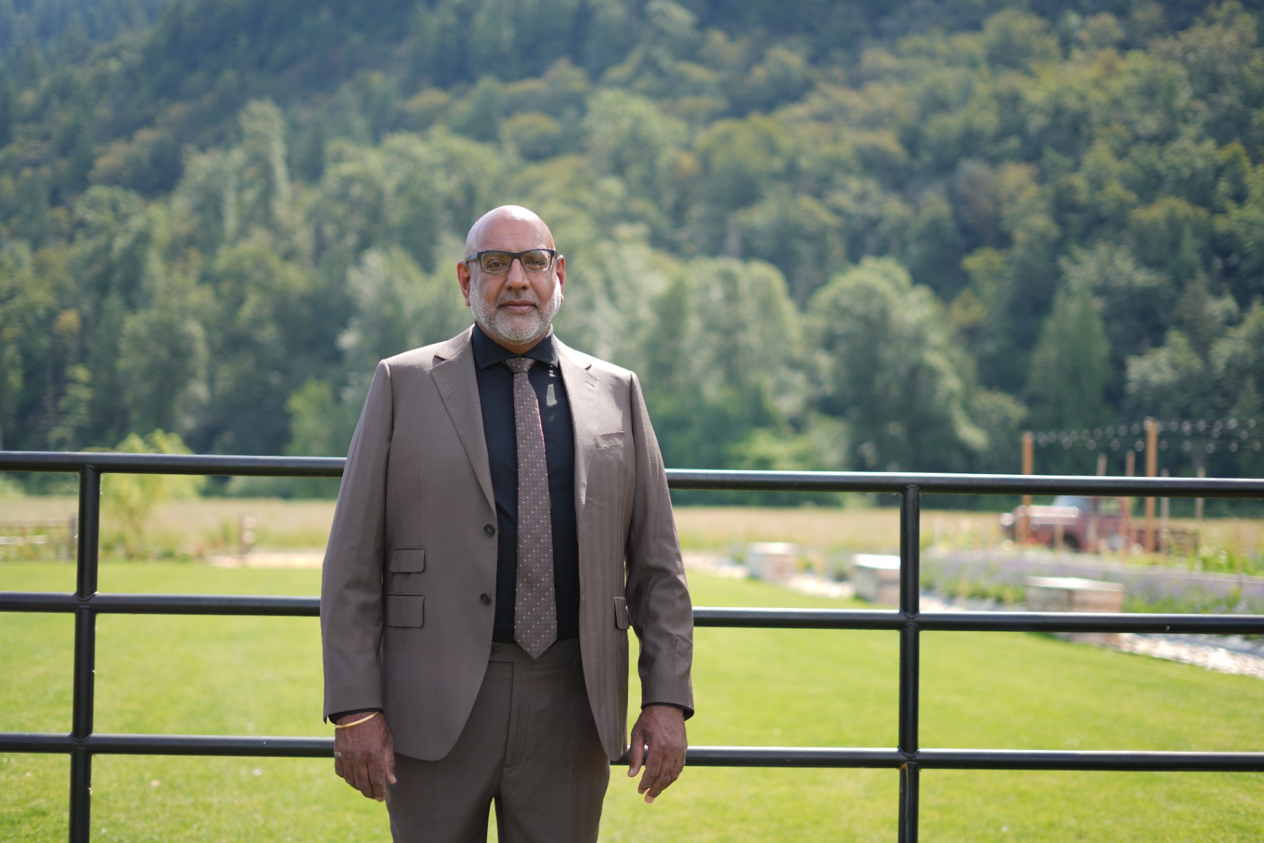 Tan bespoke suit with patterned tie photographed in the Fraser Valley